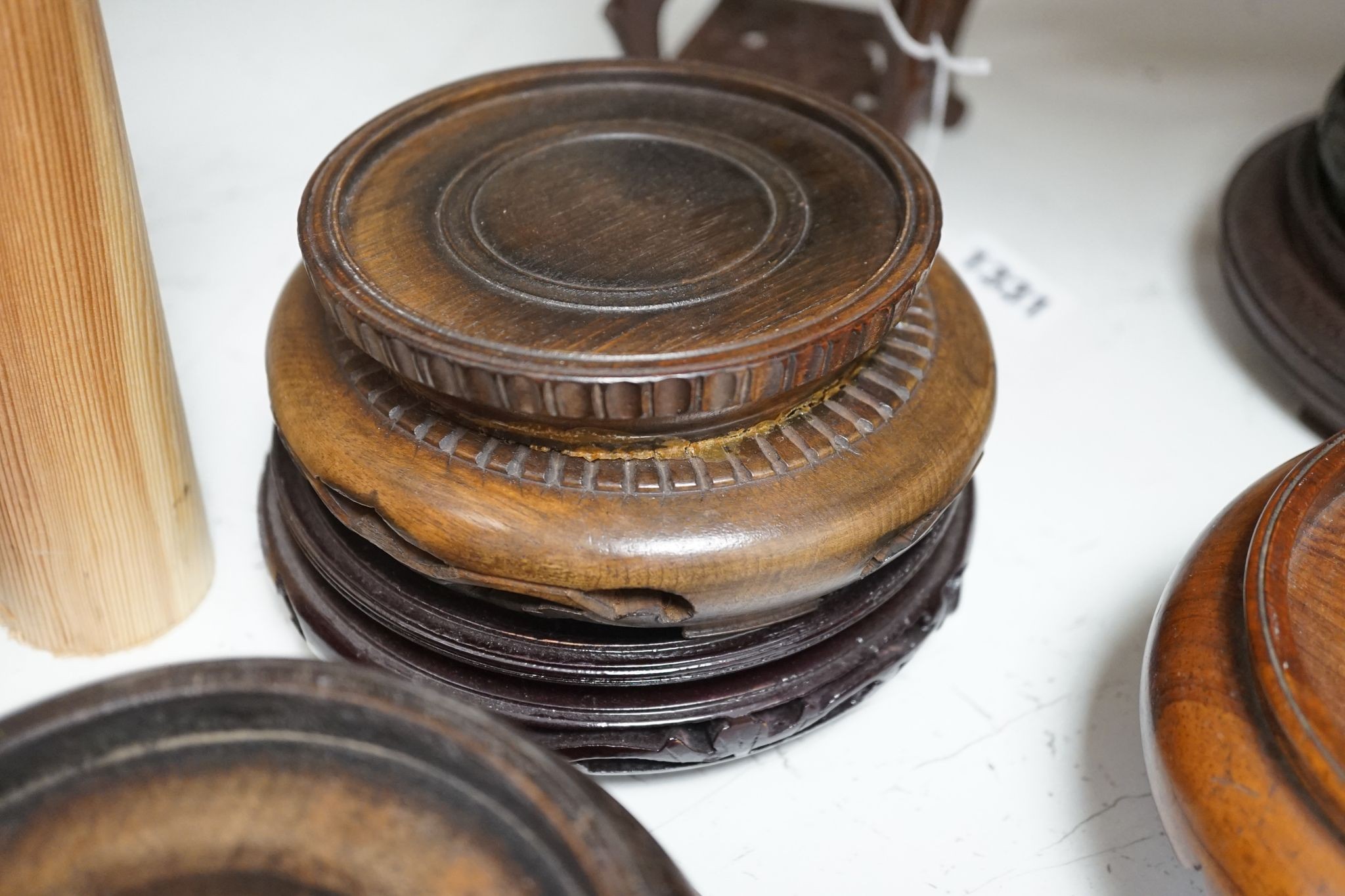 A group of 17 Chinese or Oriental hardwood stands